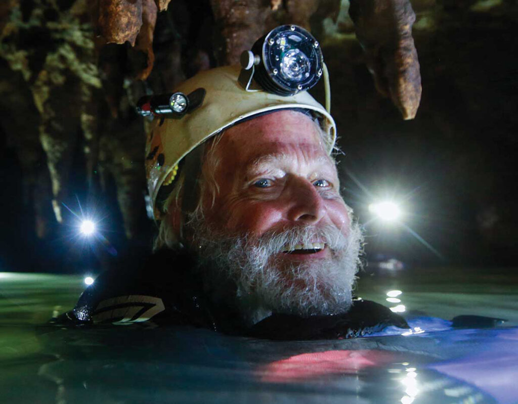 Bill Steele exploring caves in Texas